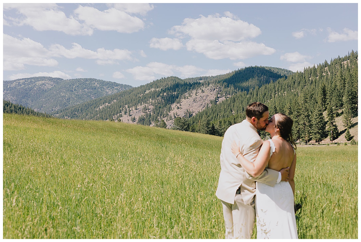 Montana love story bride and groom kiss