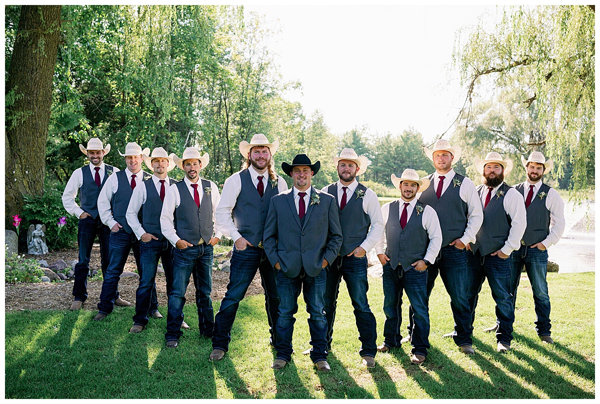 Wisconsin western wedding groomsmen smile