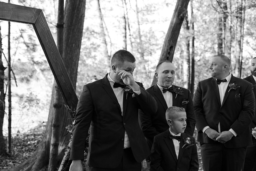 Groom crying at Campground wedding in Wisconsin